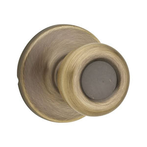 Kwikset Tylo Hall/Closet Knob in Antique Brass